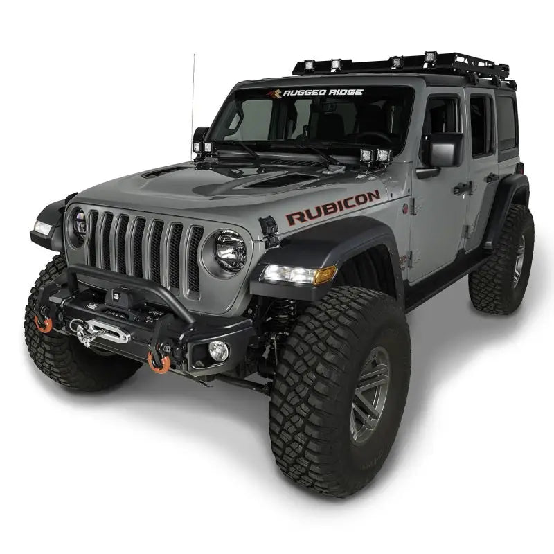 Gray Jeep with Rugged Ridge Arcus Front Bumper Tube Overrider Black logo.
