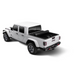White Jeep with black top and wheels displayed in Rugged Ridge Armis Hard Rolling Bed Cover 2020 Gladiator JT.