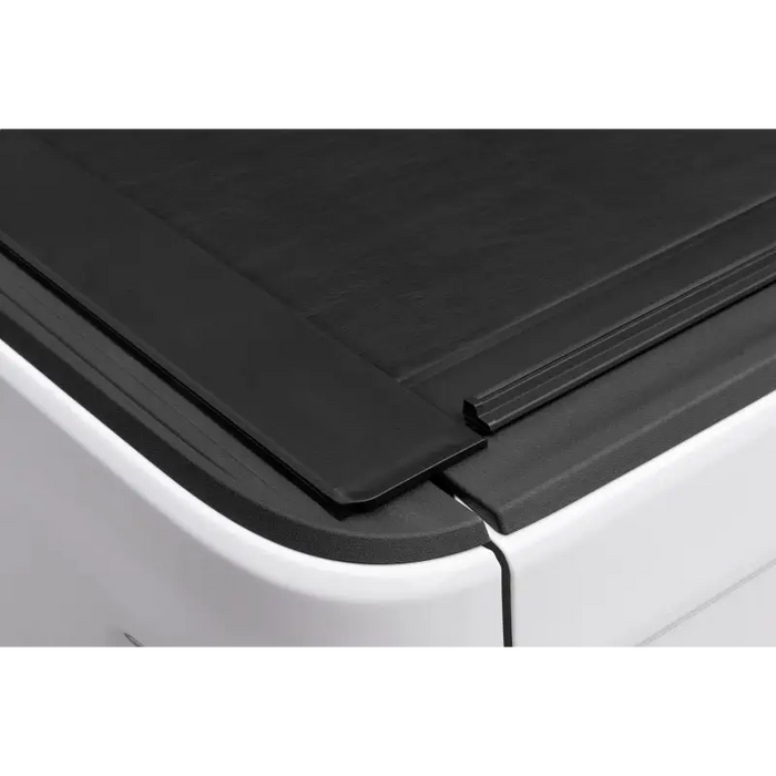 Rugged Ridge Armis Retractable Locking Bed Cover on White Truck