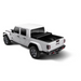 White Jeep with black top and wheels on Rugged Ridge Armis Soft Folding Bed Cover 2020 Gladiator JT