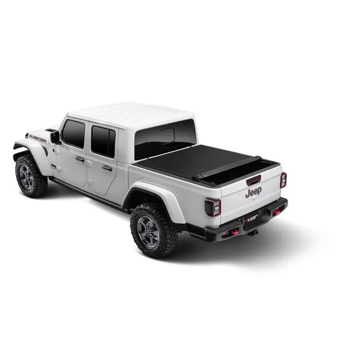 Rugged Ridge Armis Soft Rolling Bed Cover on white truck with black cover