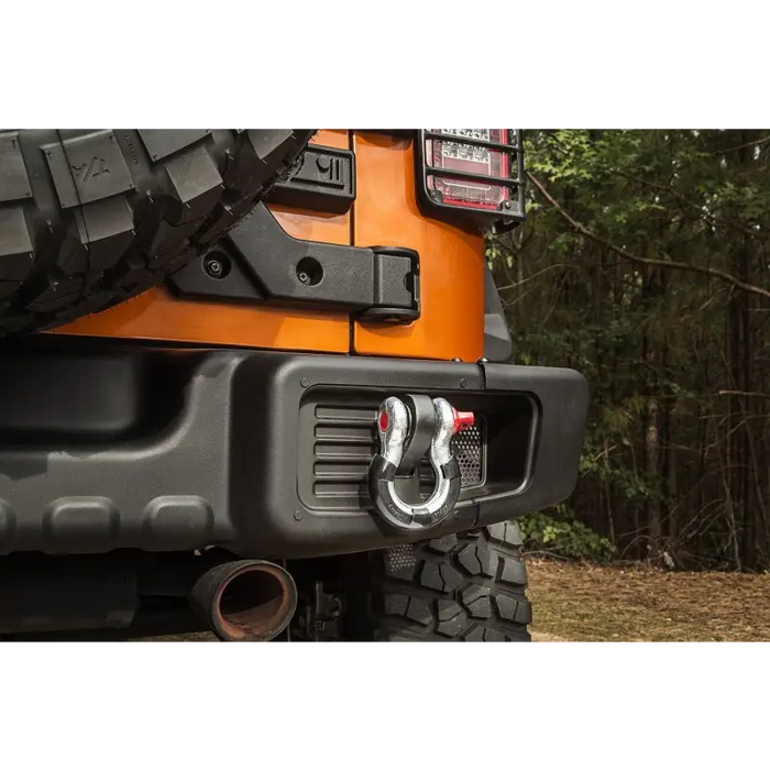 Rugged Ridge Black 7/8in D-Ring Isolator Kit featuring close up of Jeep with tow bar