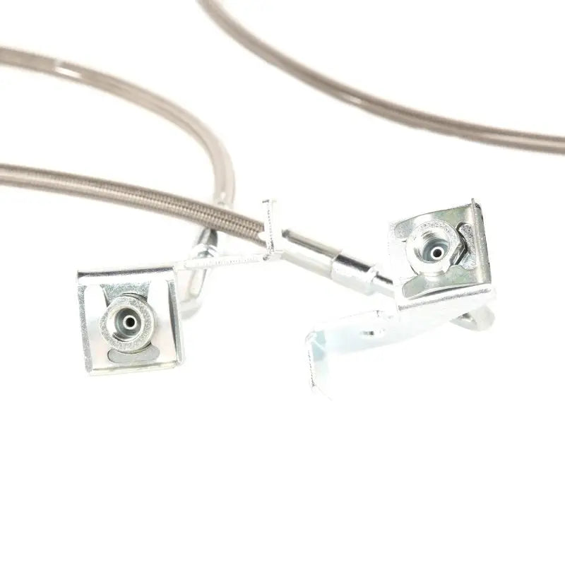 Pair of stainless steel earrings on white background.