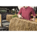 Man loading hay into truck - Rugged Ridge C3 Cargo Cover for Jeep Wrangler JKU
