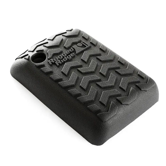 Black leather iPhone case displayed on Rugged Ridge Center Console Cover for 97-01 Jeep Wrangler TJ