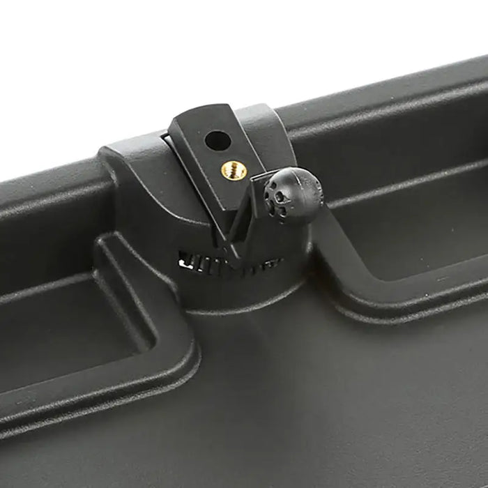 Rugged Ridge Dash Multi-Mount Charging Phone Kit with metal object held in black plastic case.
