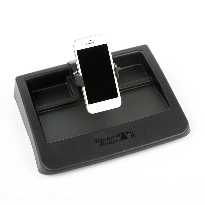 Rugged Ridge Dash Multi-Mount Phone Kit with black phone holder and white phone in it.