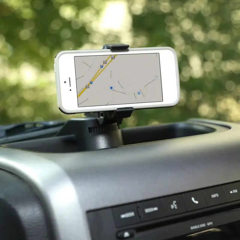 Car dashboard with GPS device on Rugged Ridge Dash Multi-Mount Phone Kit for 11-18 Jeep Wrangler.