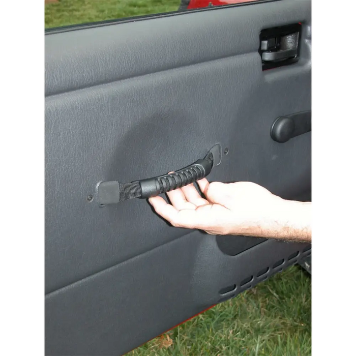 Hand opening Rugged Ridge Door Pull Straps on Jeep Wrangler