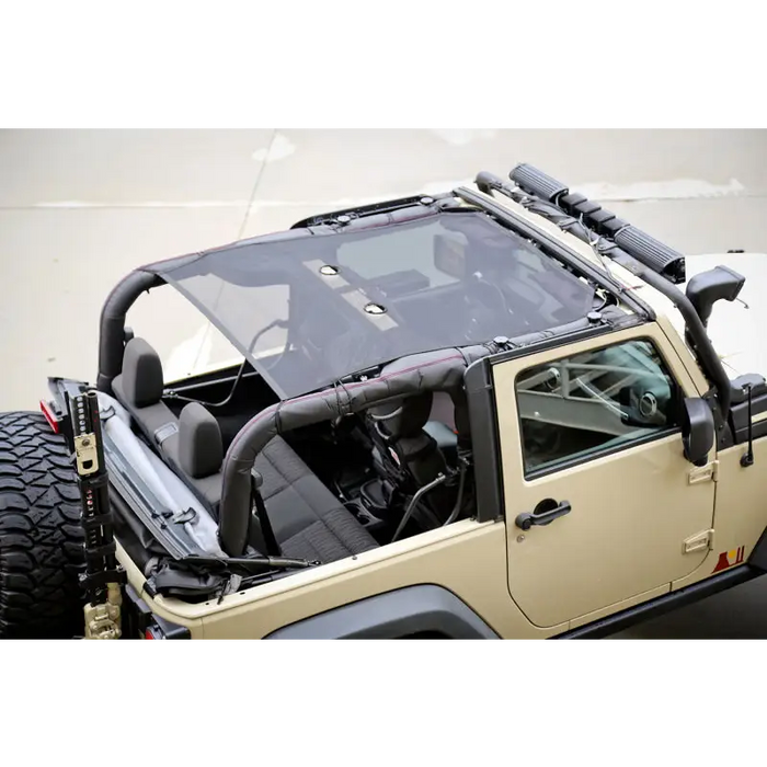 Rugged Ridge Eclipse Sun Shade for Jeep Wrangler with Roof Rack and Steering Wheel.