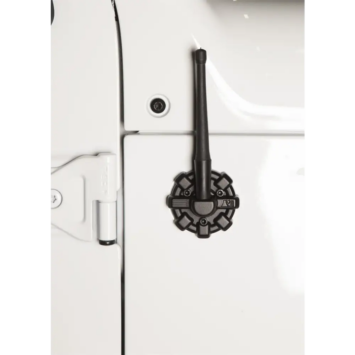 Rugged Ridge Elite Antenna Base for 07-20 Jeep JK/JL/JT: side view of white van with black handle