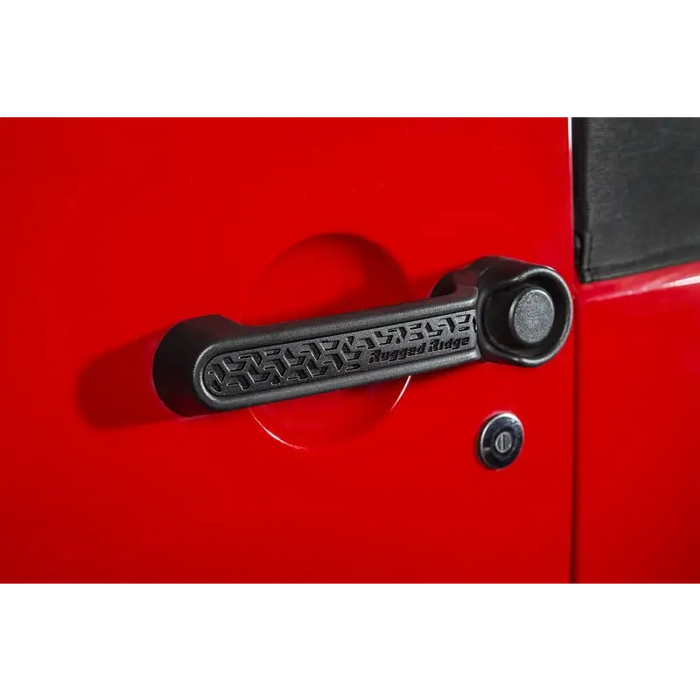 Rugged Ridge Elite red car door handle with ’on it’ text.