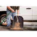 Man cleaning tire with hose - Rugged Ridge Floor Liner Cargo Black Jeep Wrangler Jl