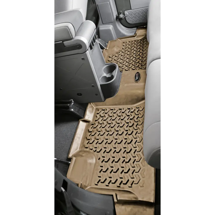Rugged Ridge Floor Liner for Jeep Wrangler Unlimited JK 4 Dr - Front and rear seats with brown carpet.