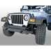 Close-up of jeep with bumper-mounted rugged ridge Front Fender Guards Body Armor for 97-06 Jeep Wrangler