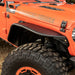 Rugged Ridge HD Steel Tube Fenders Front Pair Black 18-19 JL: Orange and black Jeep with orange wheels