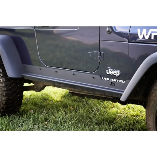 Jeep Wrangler LJ with Jeep logo on side, Rugged Ridge Heavy Duty Side Rocker Guards