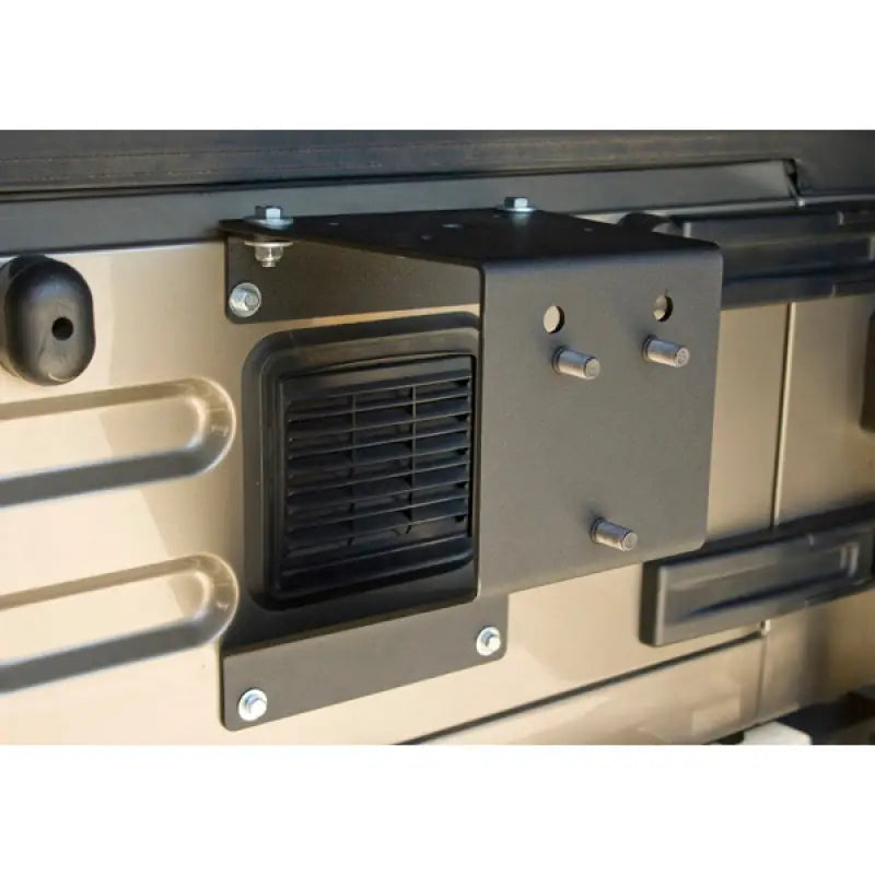 Metal grill with vent on Rugged Ridge Tire Carrier Mount.