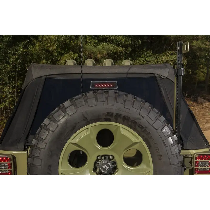 High mount LED brake light on rear of Jeep Wrangler with tire cover