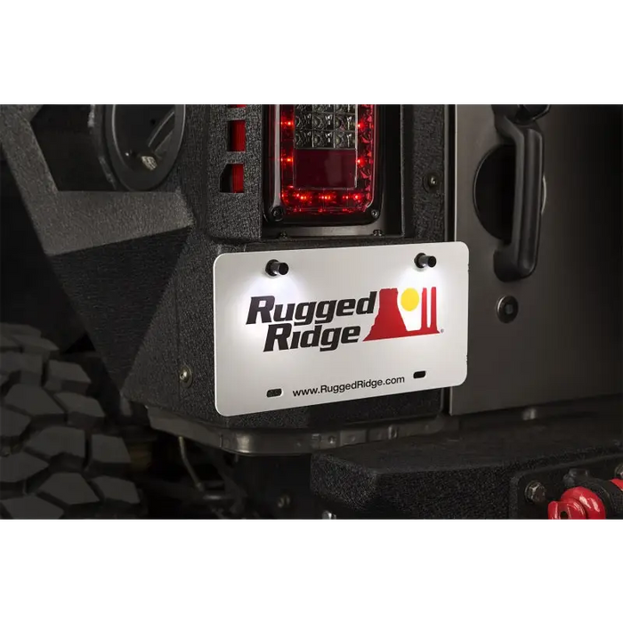 Rugged Ridge logo on Jeep license plate bolts.