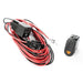 Car battery charger with red cord on Rugged Ridge Light Wiring Harness Kit 1 Light Amber Switch.