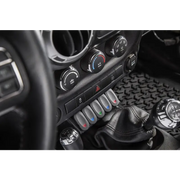 Steering controls in 2019 Jeep with Rugged Ridge Lower Console Switch Panel.