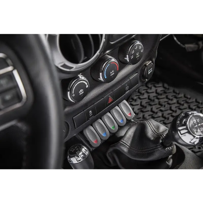 Steering controls in 2019 Jeep with Rugged Ridge Lower Console Switch Panel.