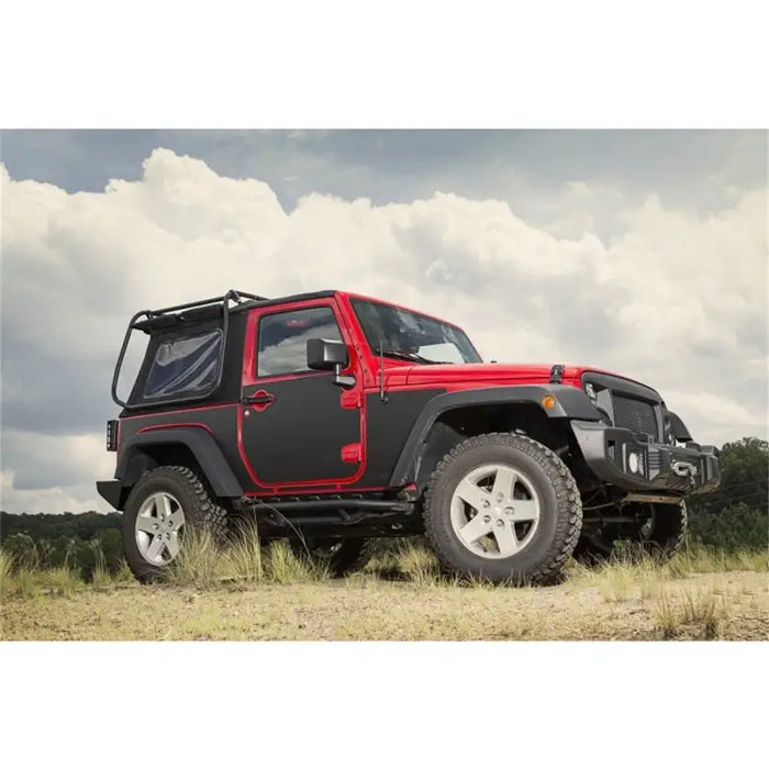 Red Jeep parked in field - Rugged Ridge Magnetic Protection Panel Kit for 07-18 Jeep Wrangler.