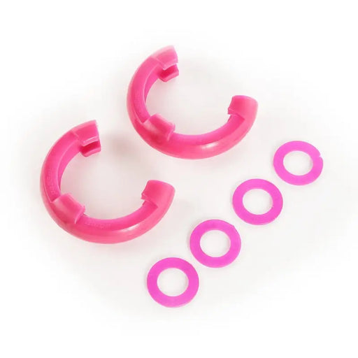 Pink plastic hoop earrings displayed in Rugged Ridge Pink 3/4in D-Ring Isolator Kit.