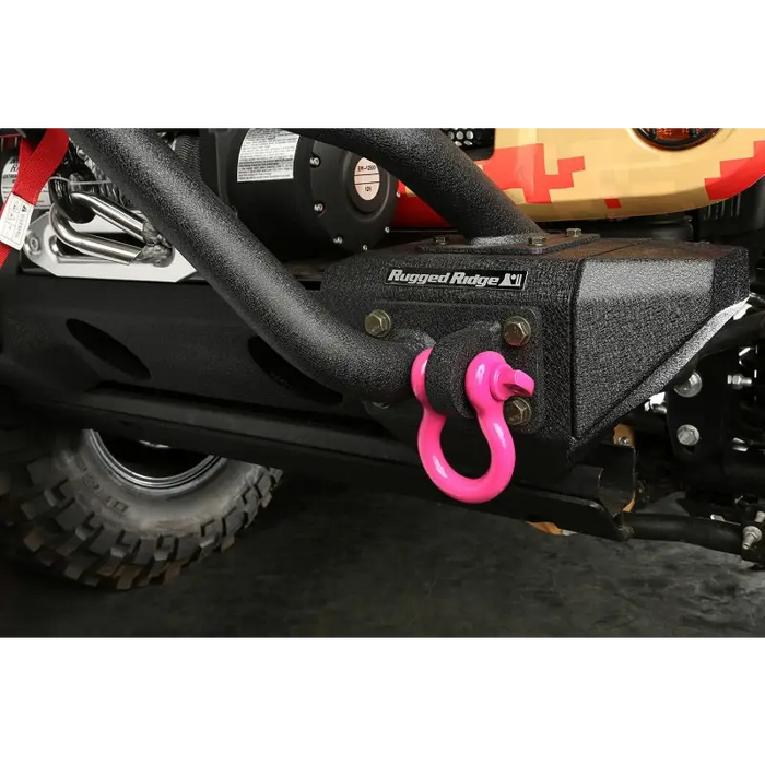 Pink handle on a ATV displayed in Rugged Ridge Pink 3/4in D-Ring Shackles.