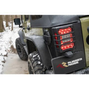 Close up of a red light on rugged ridge rear corner kit body armor for 07-18 jeep wrangler jku