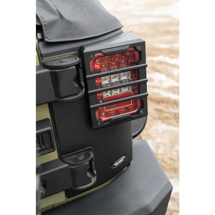 Rugged ridge rear corner kit body armor for 07-18 jeep wrangler jku, rear light mounted on vehicle.