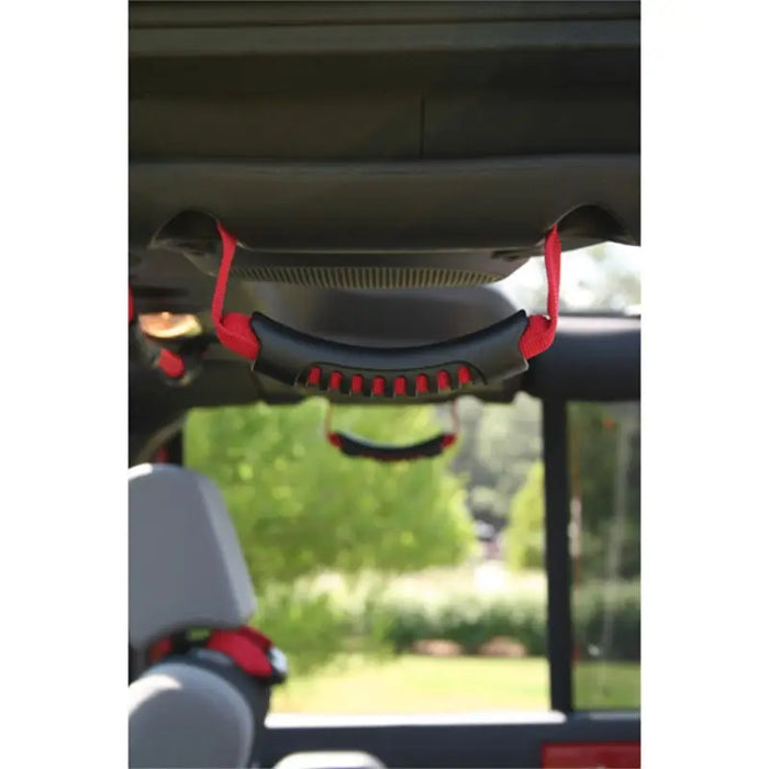 Red Jeep Wrangler Unlimited JK seat grab handles attached to rear of car