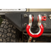 Rugged Ridge red D-ring isolator on front of vehicle