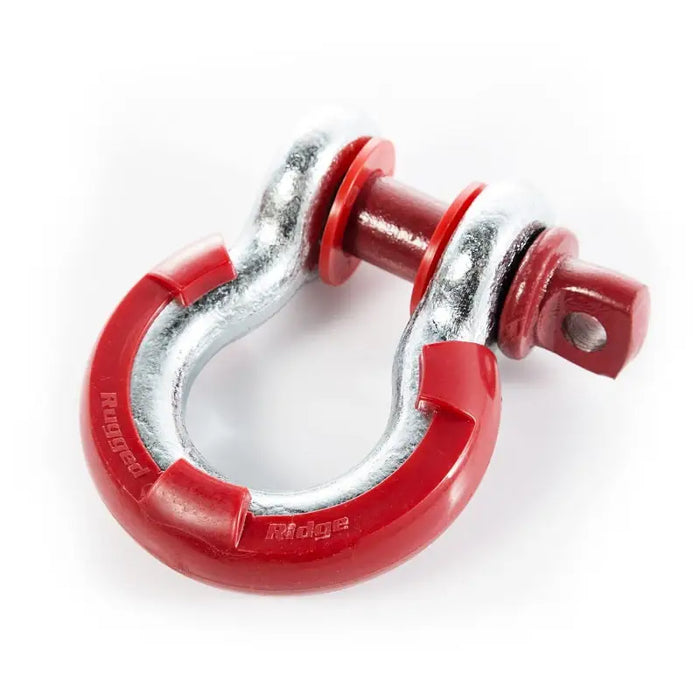 Close up of red Rugged Ridge D-ring isolator on metal shackle