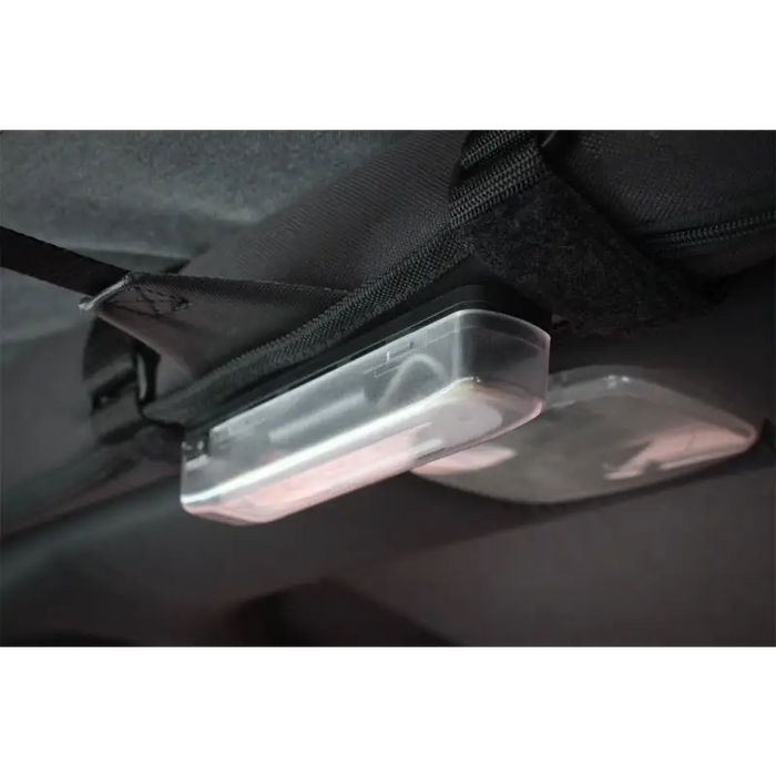 Backpack with clear cover displayed in Rugged Ridge Roll Bar Mounted Interior Courtesy LED Light.