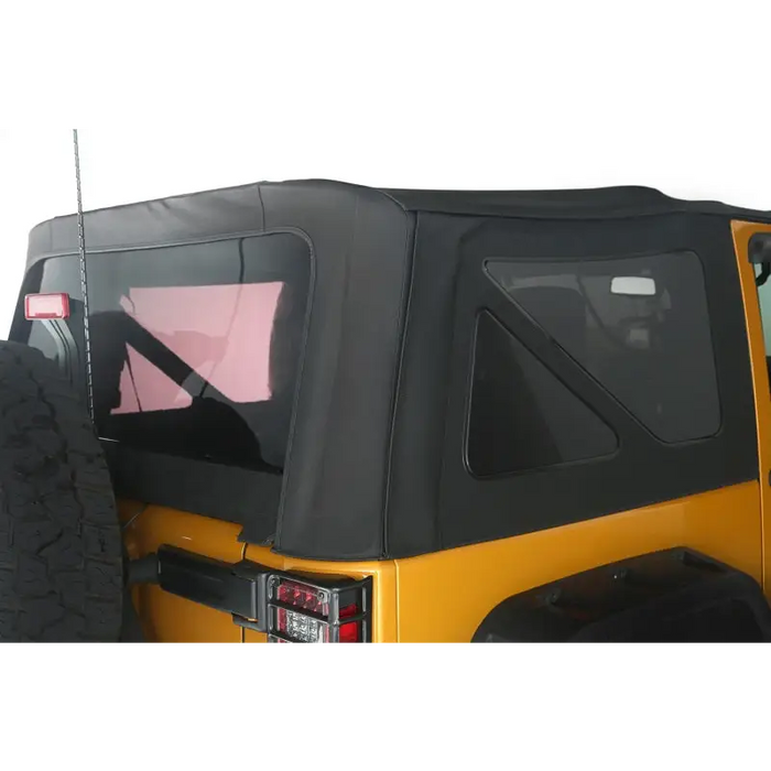 Yellow Jeep with Rugged Ridge Sailcloth Soft Top and Black Roof