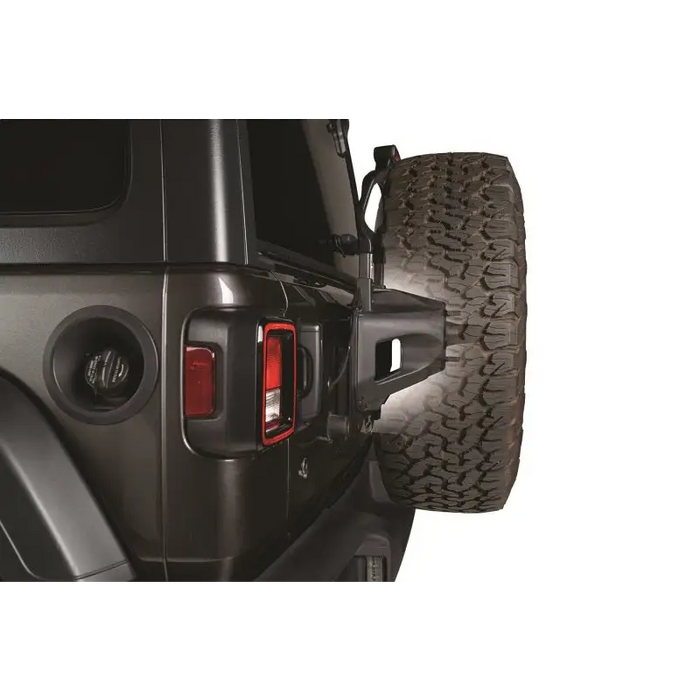 Close up of Rugged Ridge spare tire relocation bracket on Jeep Wrangler JL.