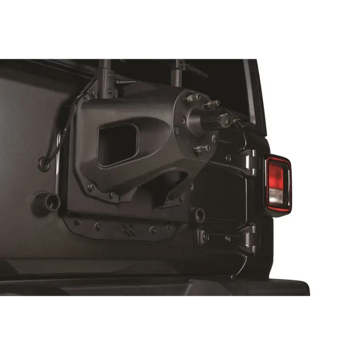 Black spare tire relocation bracket on Jeep Wrangler JL rear end.