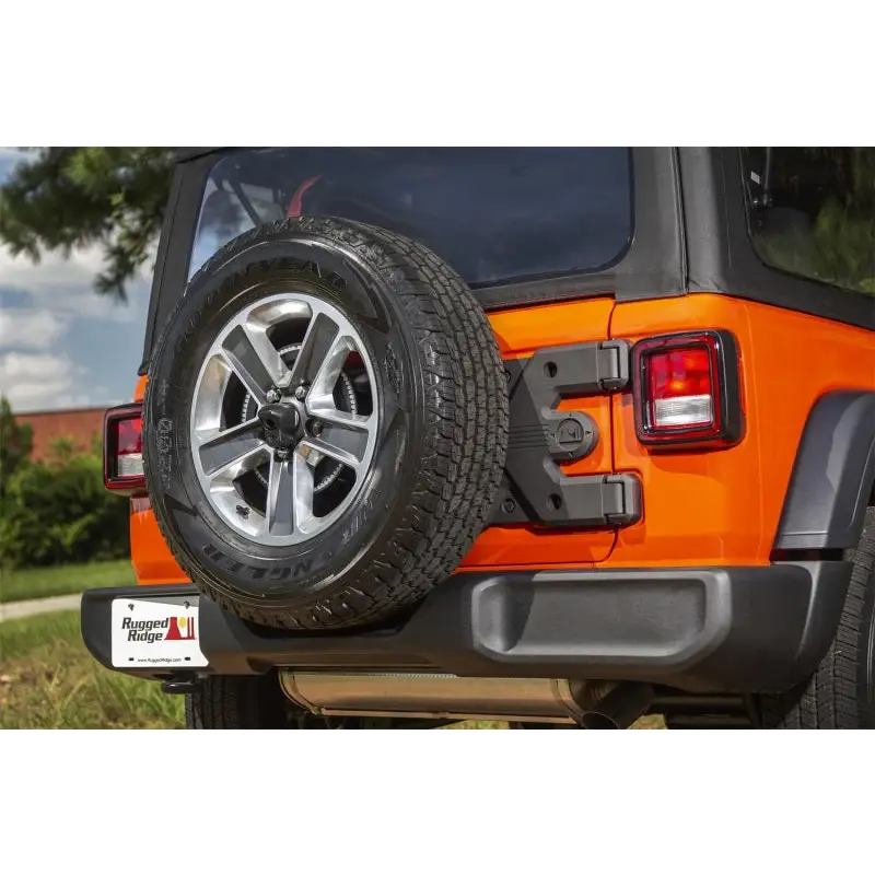 Rear bumper with tire cover removed on Rugged Ridge Spartacus HD Tire Carrier Hinge Casting for Jeep Wrangler JL.