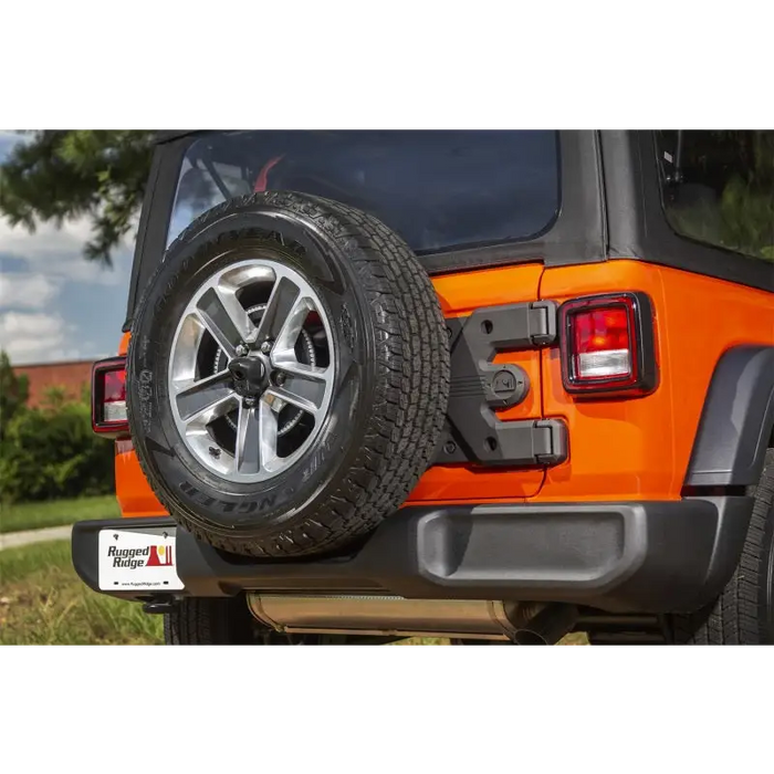 Rear bumper with tire cover removed on Rugged Ridge Spartacus HD Tire Carrier Hinge Casting for Jeep Wrangler JL.