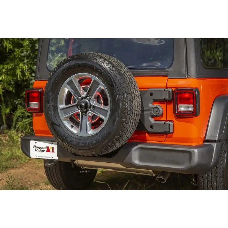 Rear tire cover on Rugged Ridge Spartacus HD Tire Carrier Hinge Casting for Jeep Wrangler JL