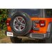 Rear tire cover on Rugged Ridge Spartacus HD Tire Carrier Hinge Casting for Jeep Wrangler JL