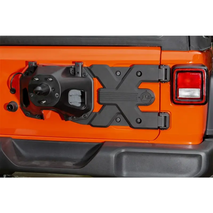 Close up of Jeep license plate on Rugged Ridge Spartacus HD Tire Carrier Hinge Casting for 18-20 Jeep Wrangler JL.