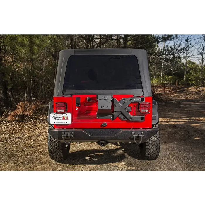 Red Jeep with Black Top and Roof - Rugged Ridge Spartacus HD Tire Carrier Hinge Casting