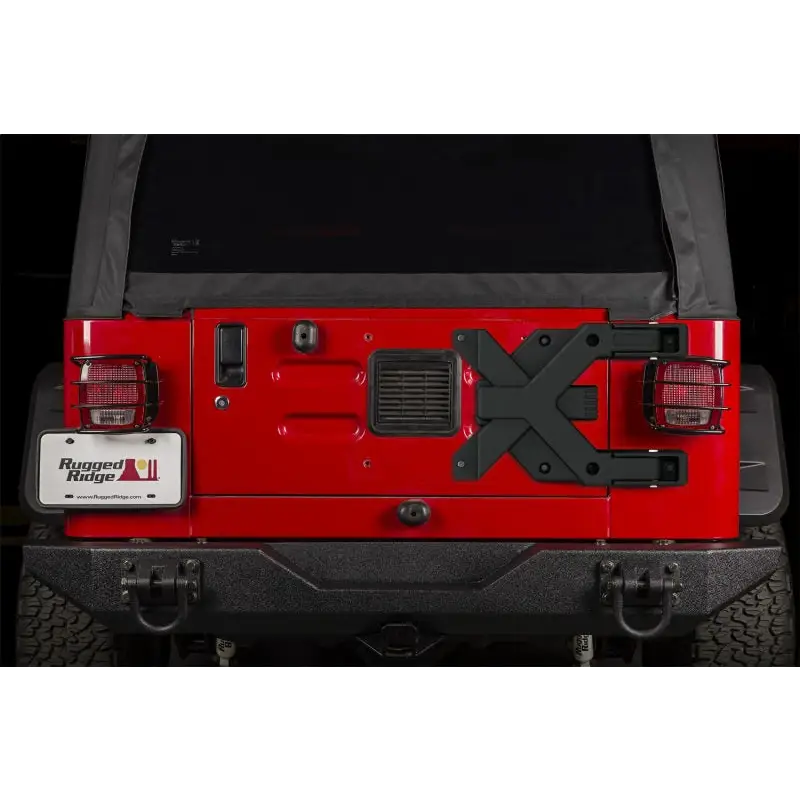 Red Jeep with Black Tail Light - Rugged Ridge Spartacus HD Tire Carrier Hinge Casting 97-06 TJ