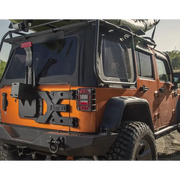 Front bumper mounted on Rugged Ridge Spartacus HD Tire Carrier Kit for Jeep Wrangler