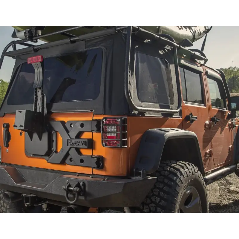 Front bumper mounted on Rugged Ridge Spartacus HD Tire Carrier Kit for Jeep Wrangler