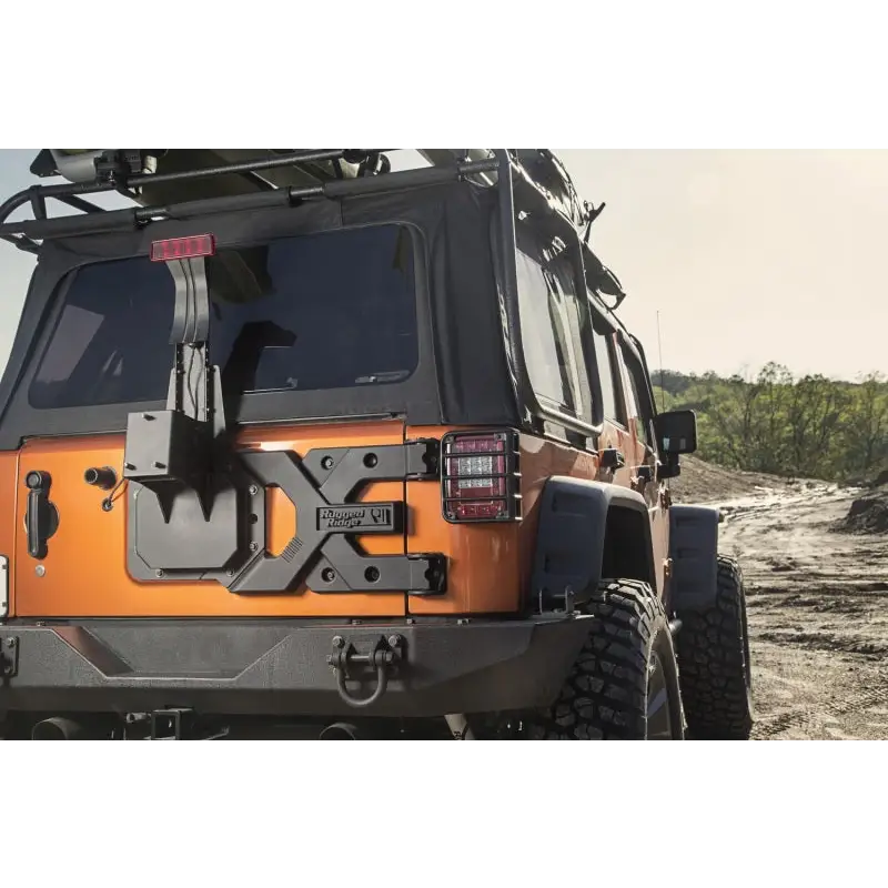 Front bumper mounted on Rugged Ridge Spartacus HD Tire Carrier Kit for Jeep Wrangler