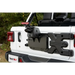 Rugged Ridge Spartacus HD Tire Carrier Kit mounted on back of a Jeep with camera